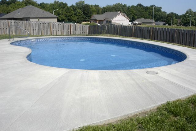 A large kidney-shaped pool